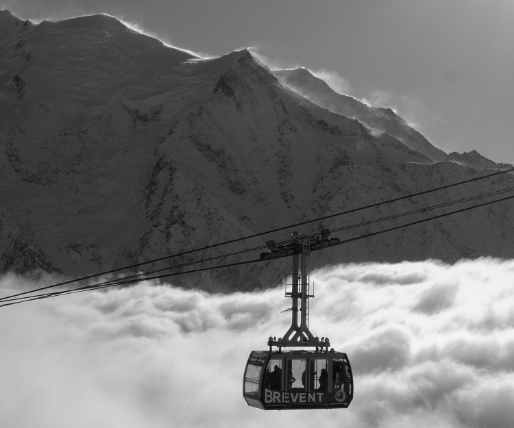 A cable car above the clouds in the mountains in Chamonix, France.